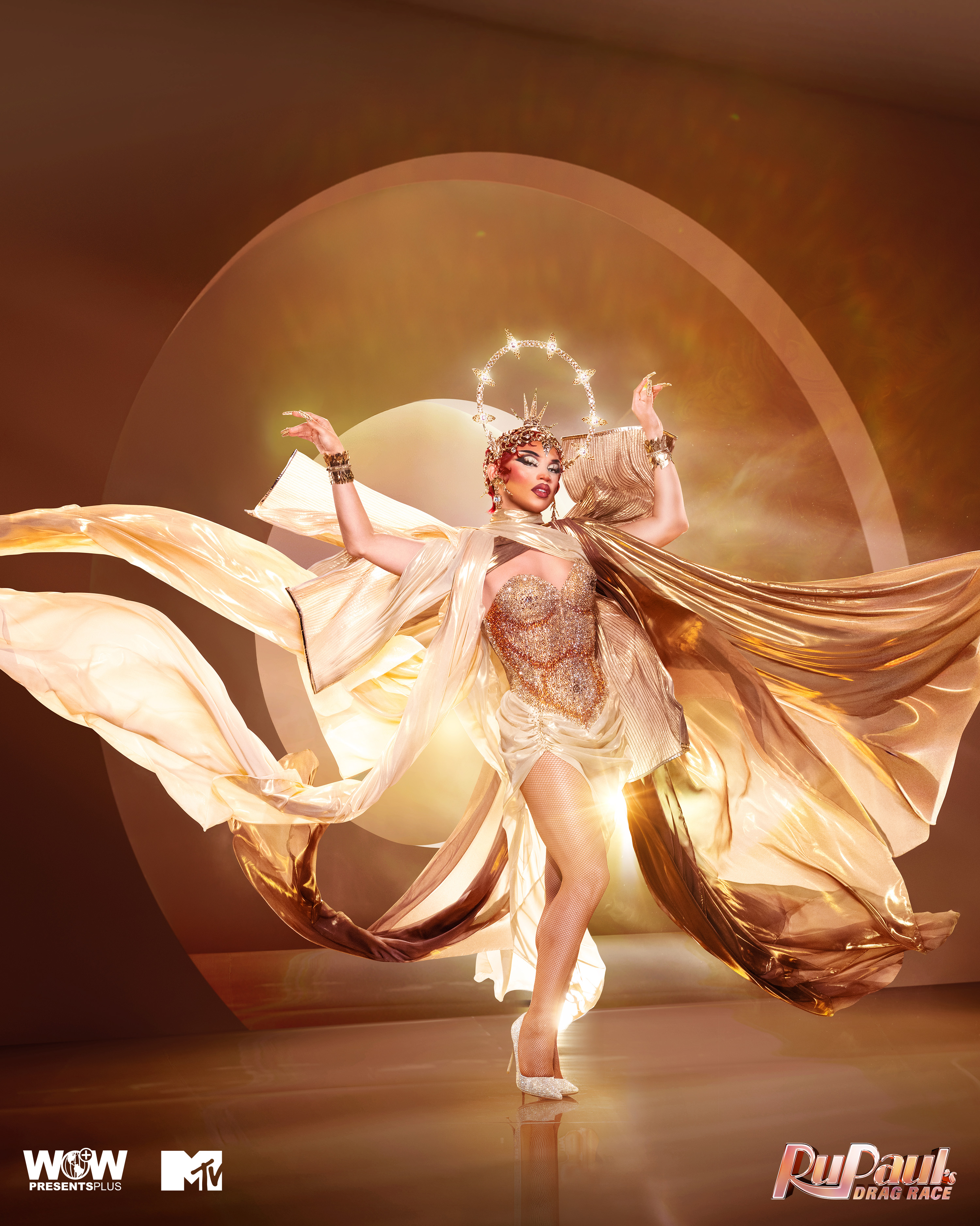 Juicy Love Dion in a dramatic gold look