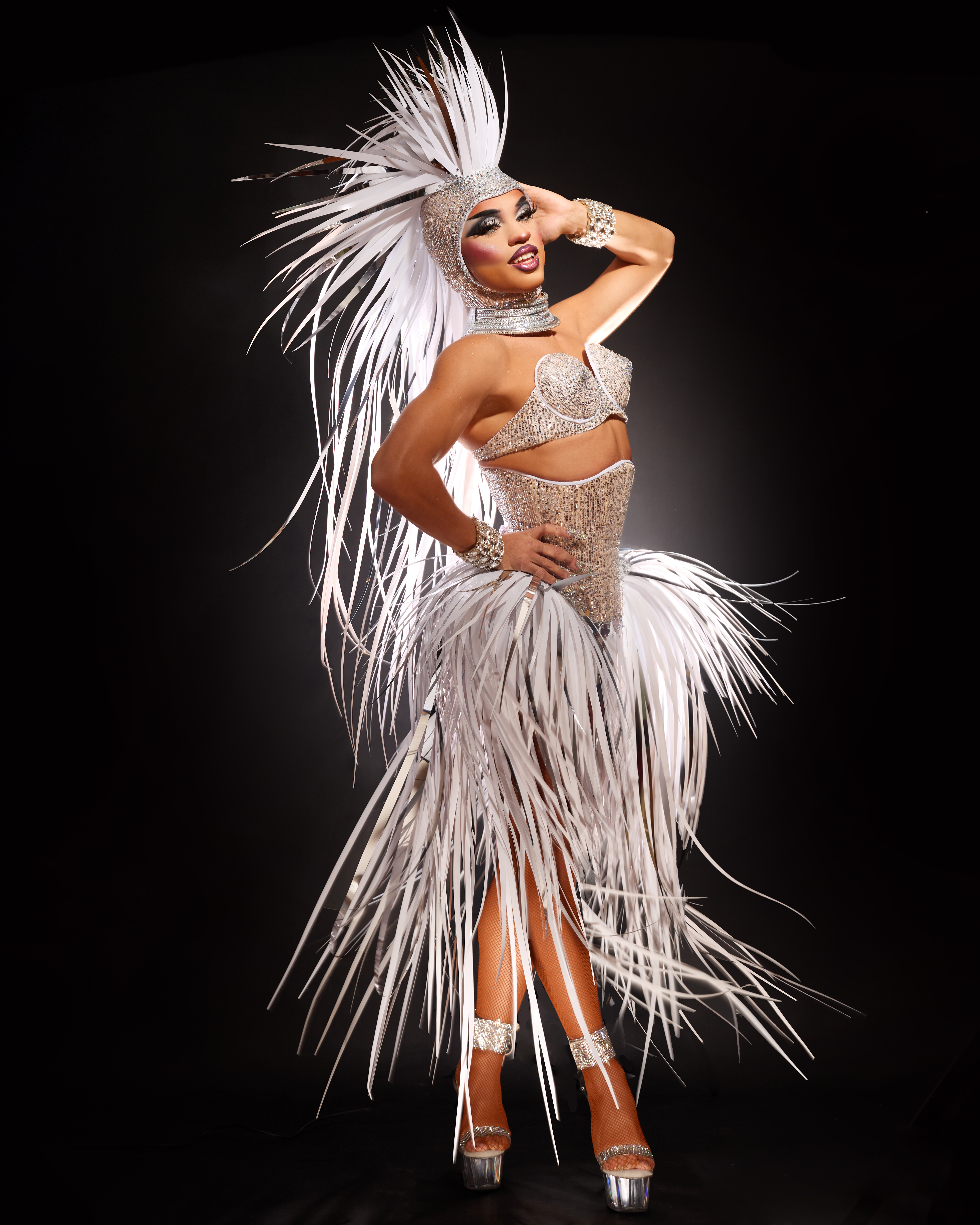 Juicy Love Dion in a silver showgirl look